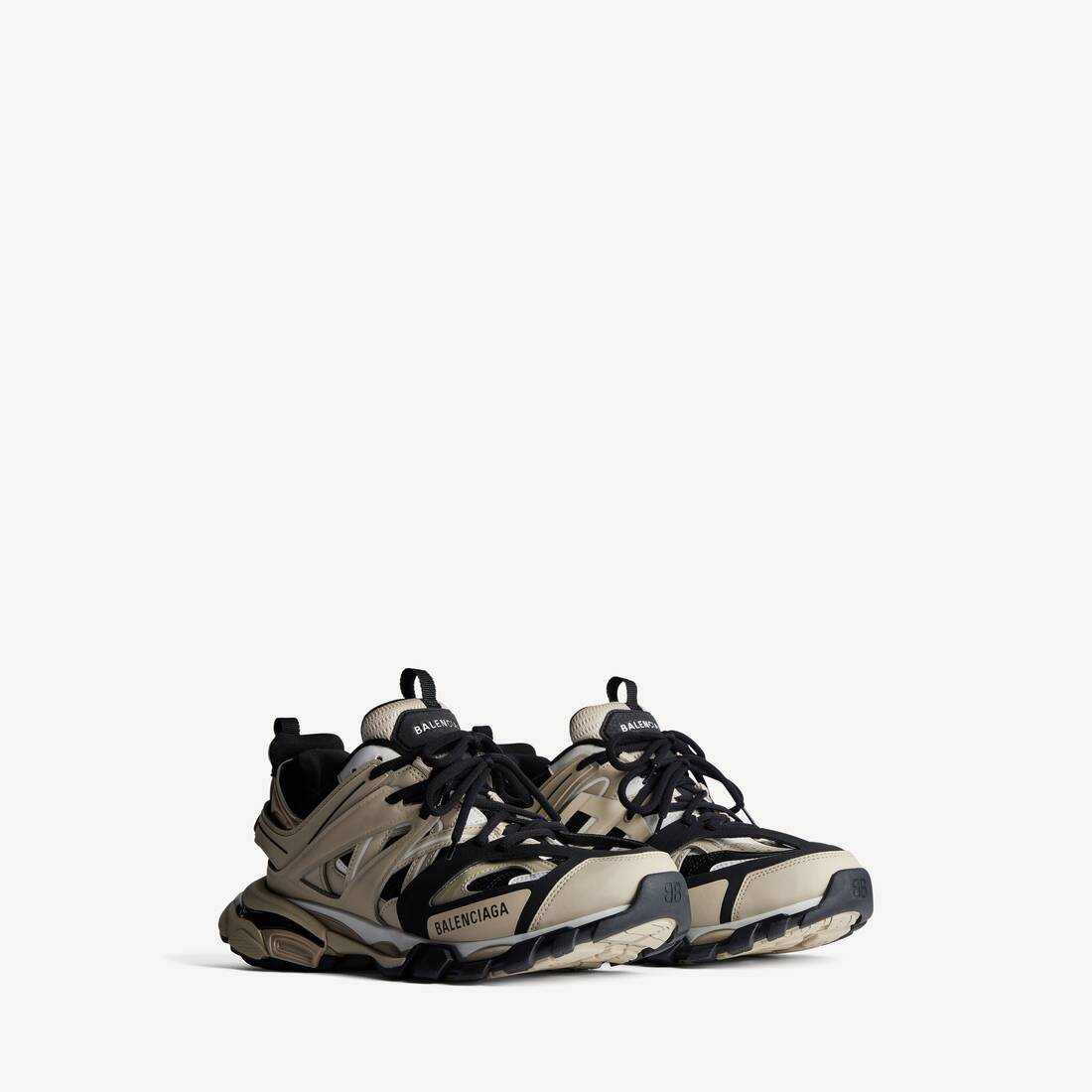 Zapatilla de pista para hombre en beige/negro