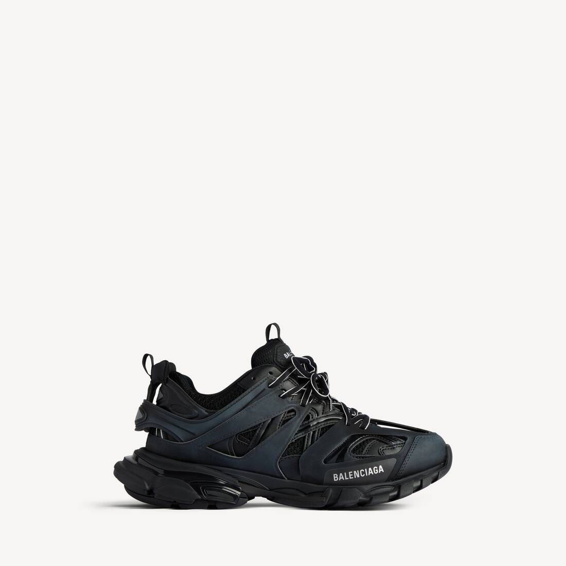 Zapatilla de pista para mujer en negro